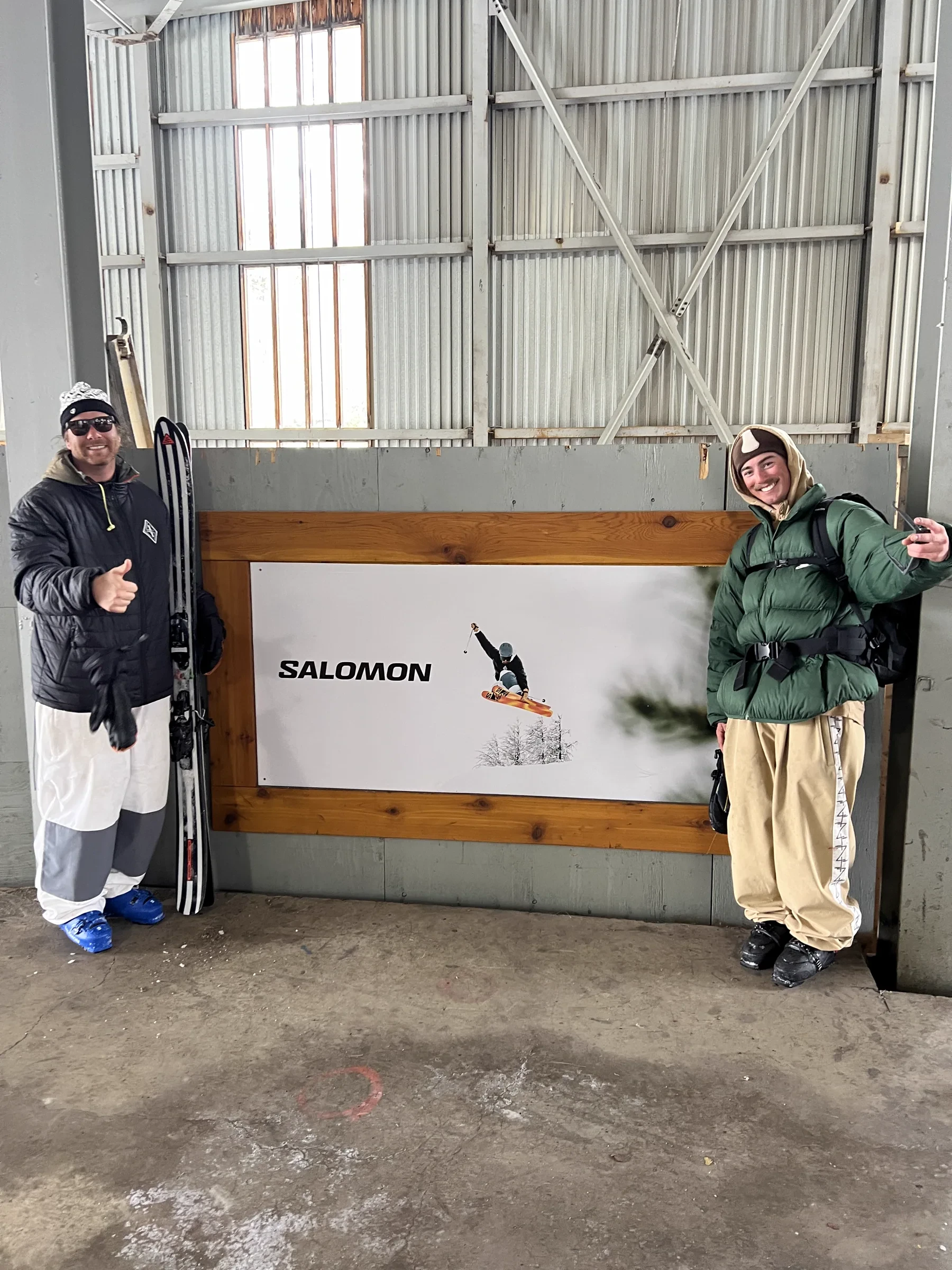 A skier and equipment framed in a winter staging area