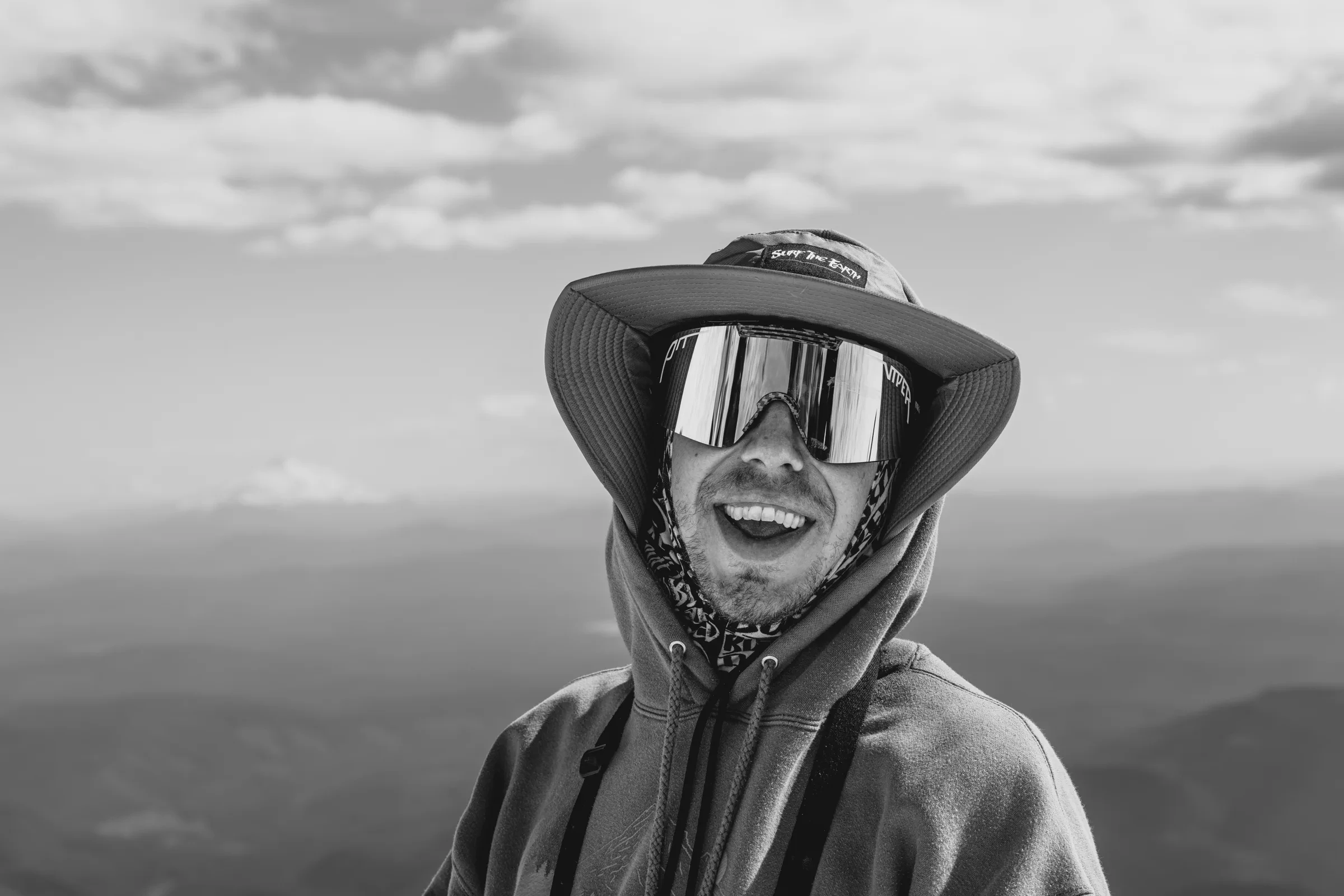 A person in winter gear against a distant horizon