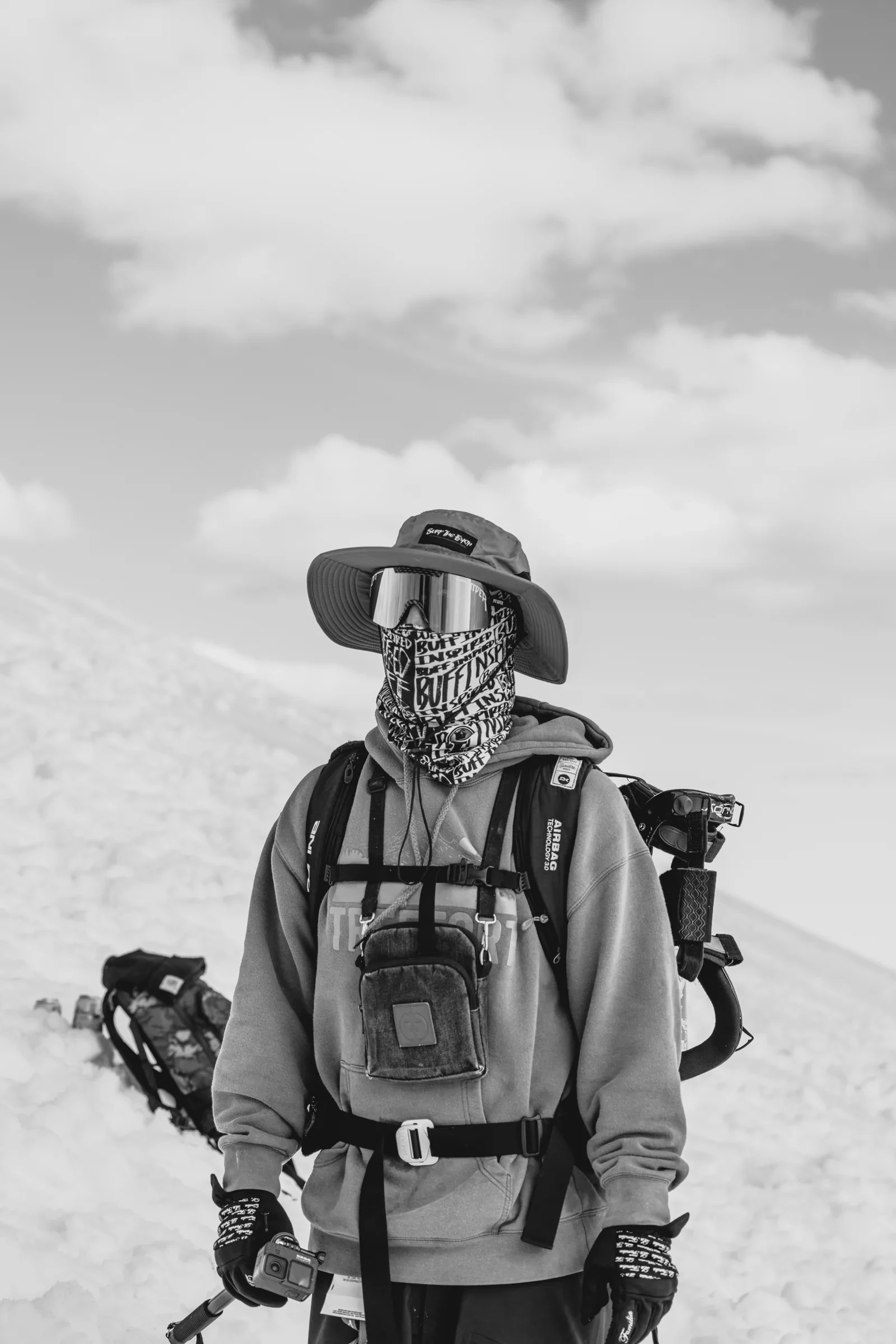A photographer working in the alpine