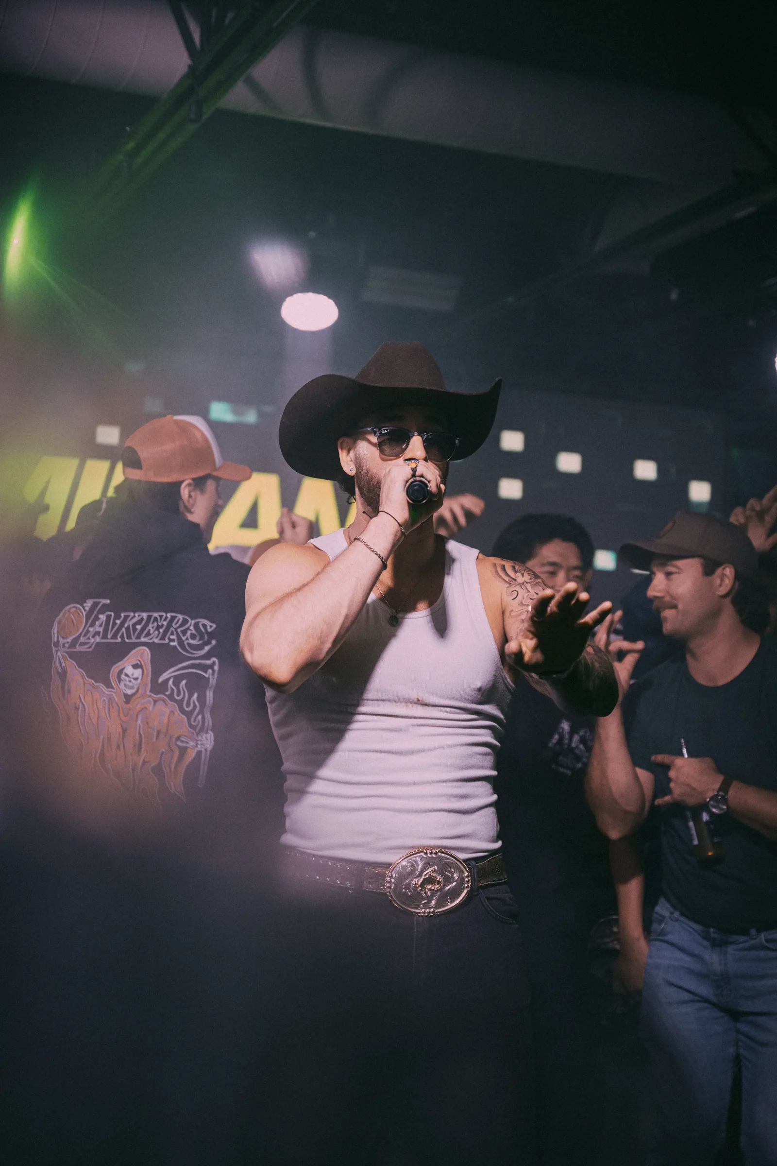 A performer singing among the crowd