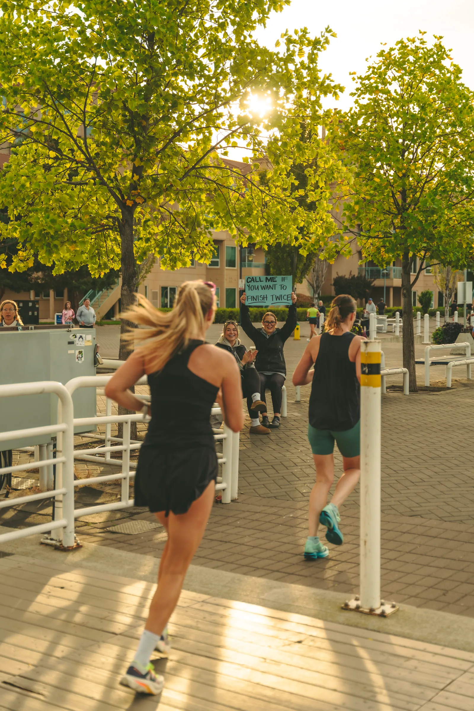 A runner framed against the lakeside route