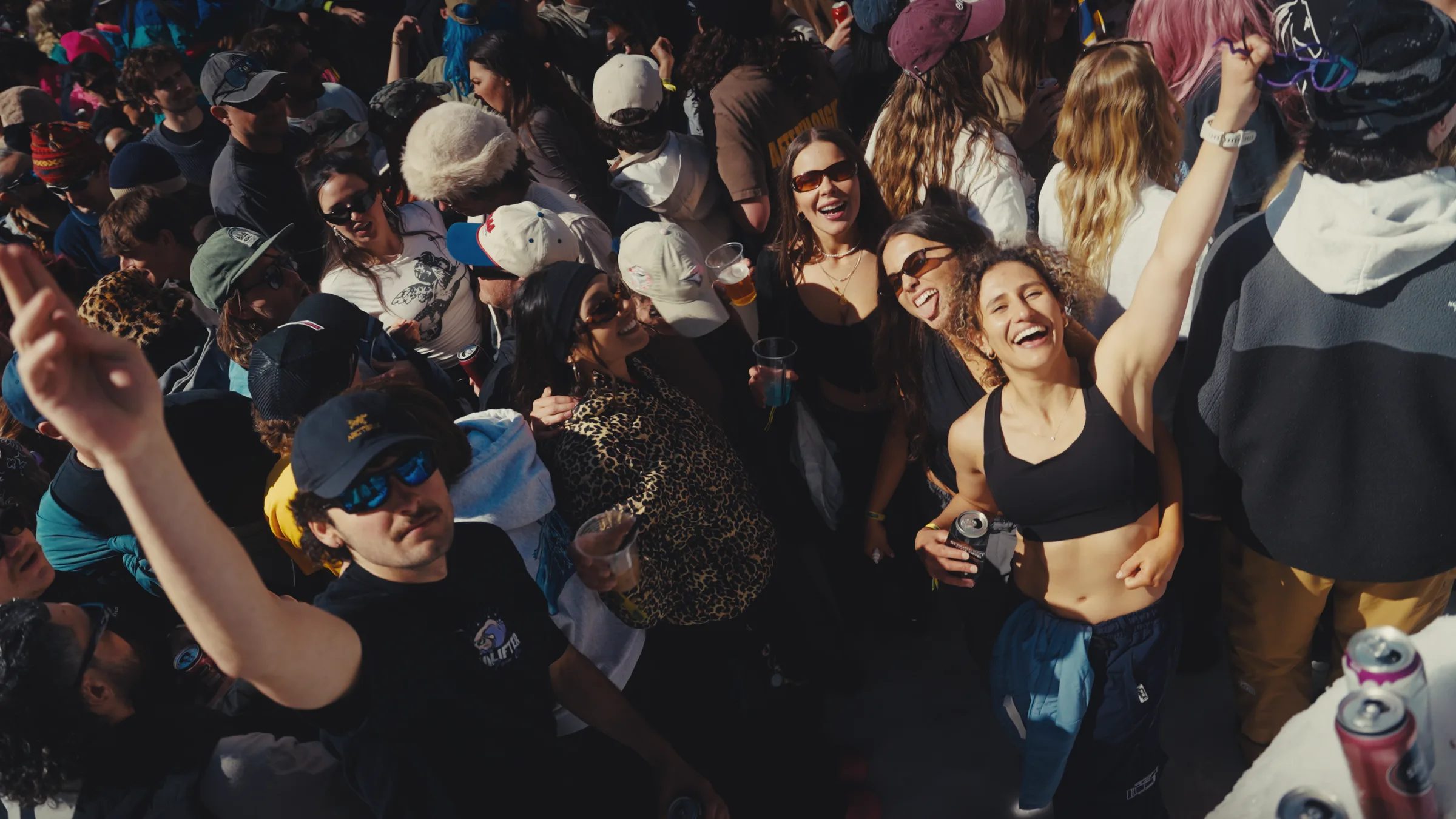 Friends celebrating in the Slush Cup crowd
